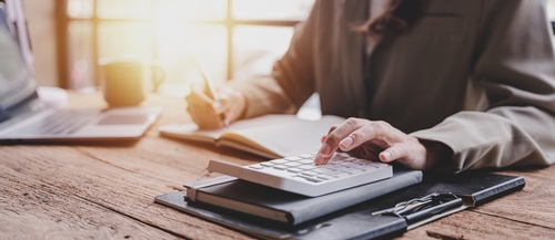 tax preparer working diligently on a tan return at Starner Tax Group in Rogers, AR